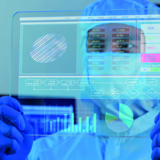 engineer holding transparent wafer tablet taiwan semiconductor engineer holding transparent tablet showing wafer manufacturing process data inside cleanroom advanced technology